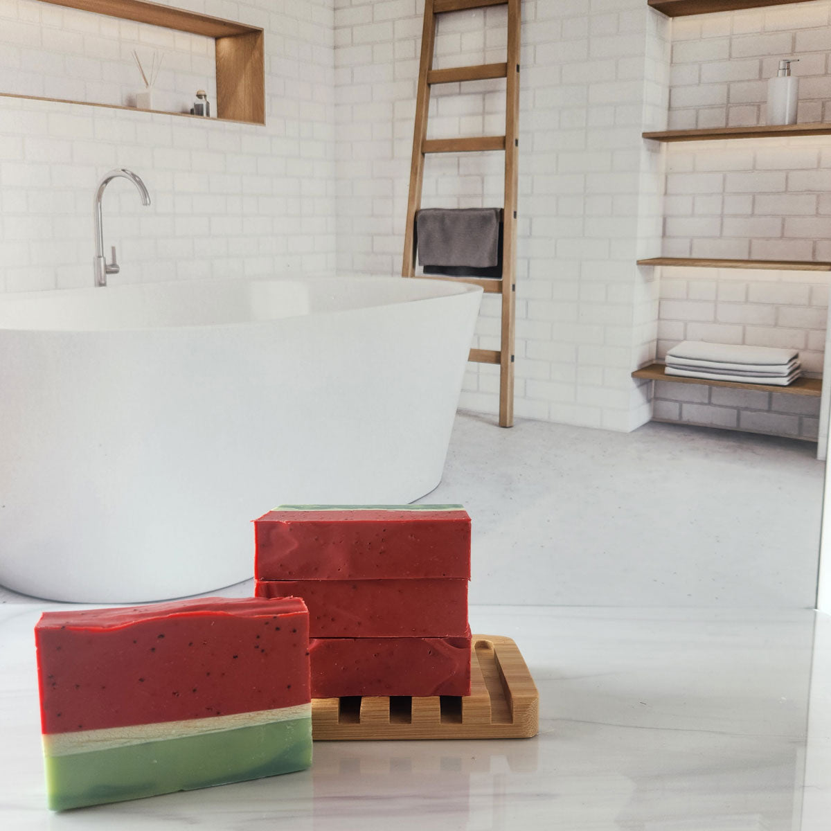 Watermelon Sugar artisan soap bars, red and green layered soap on a wooden rack in a bathroom setting.
