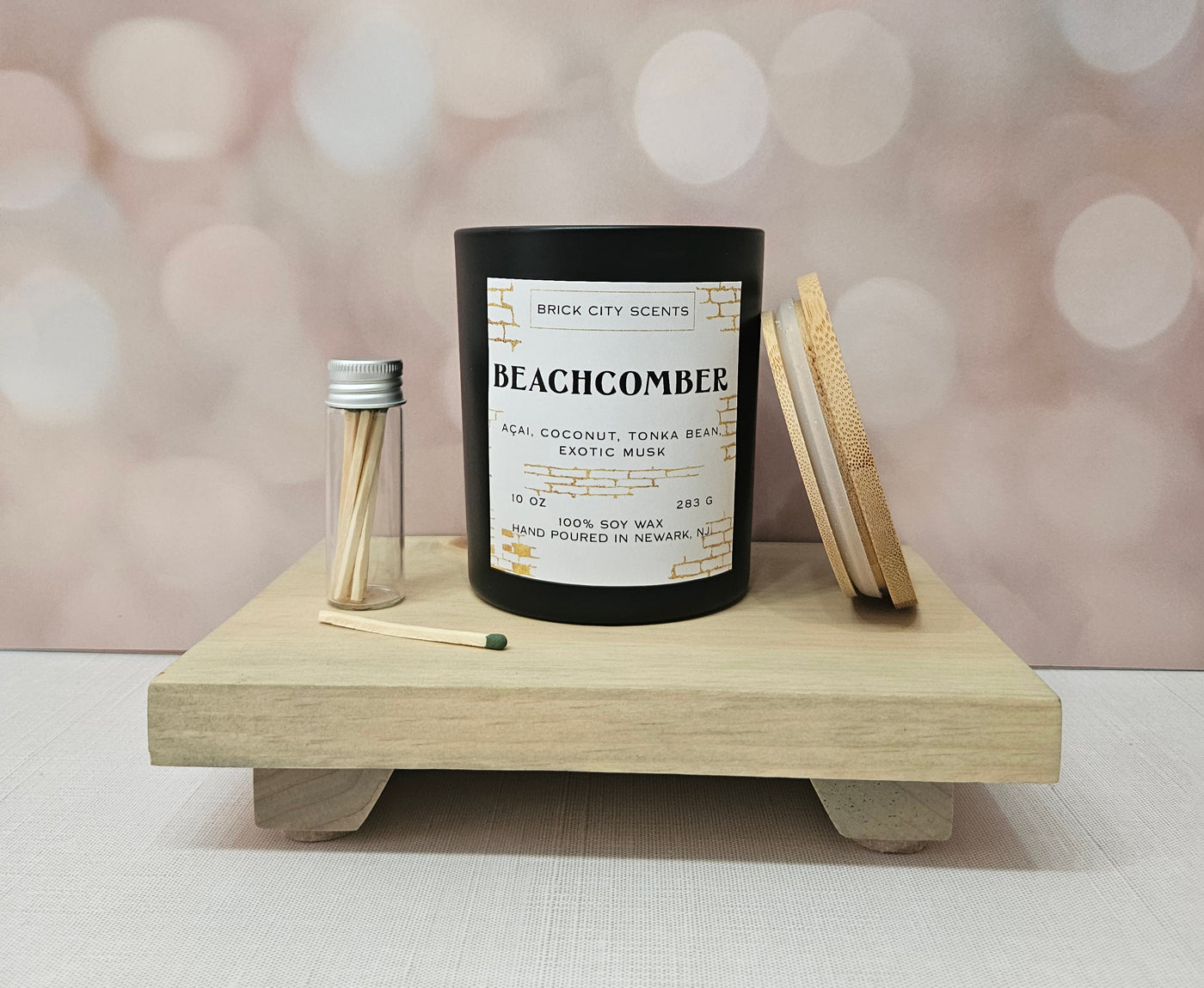 Brick City Scents Beachcomber candle, black jar with wood lid, 10 oz, made with soy wax, with matches.