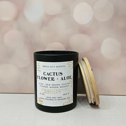 Brick City Scents Cactus Flower + Aloe candle in a black jar with wooden lid. 10 oz, 100% soy wax.