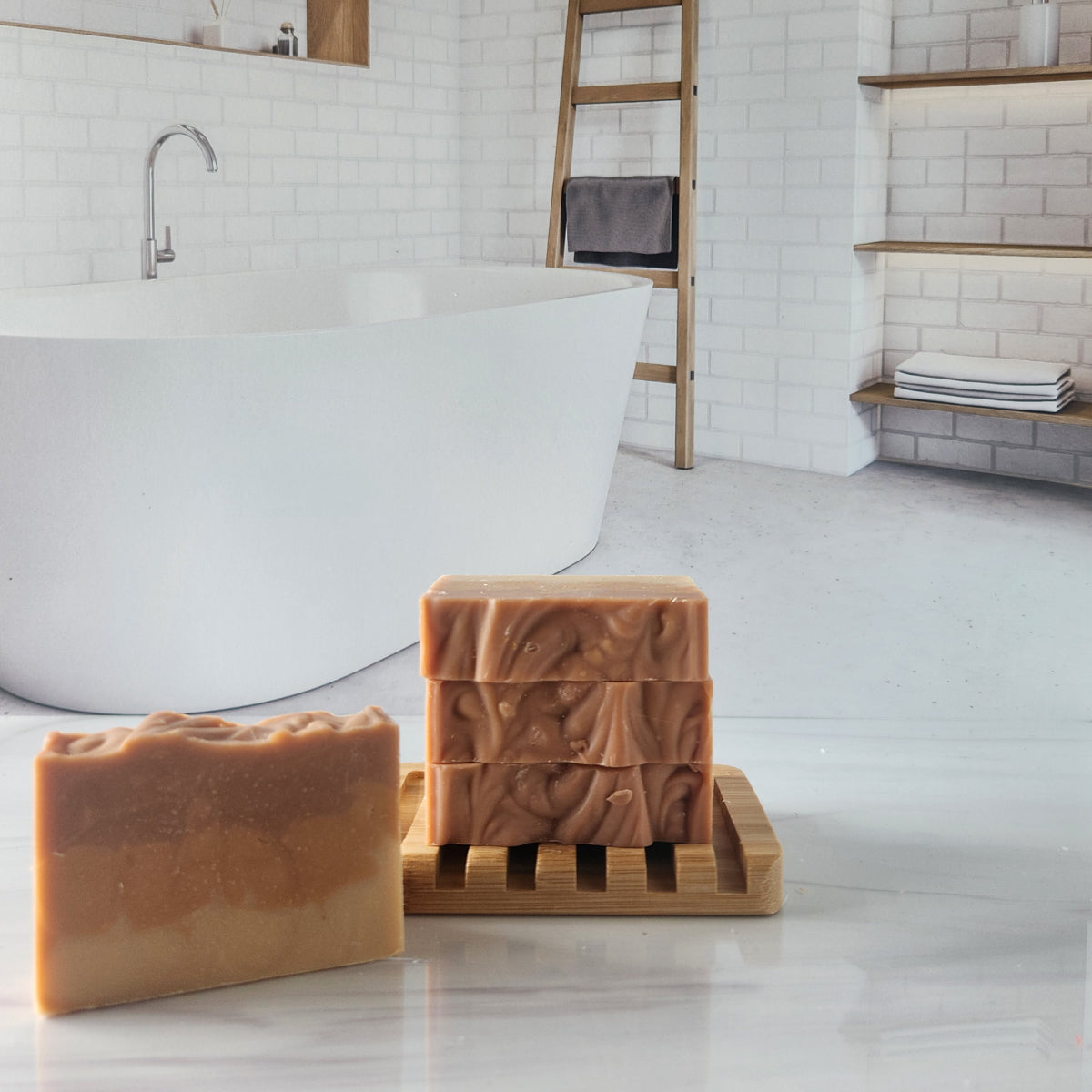 Handmade patchouli sandalwood soap bars on a wooden holder in a bathroom setting.
